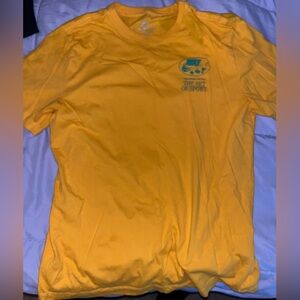 Nike Golden Yellow Tee with Green Logo
